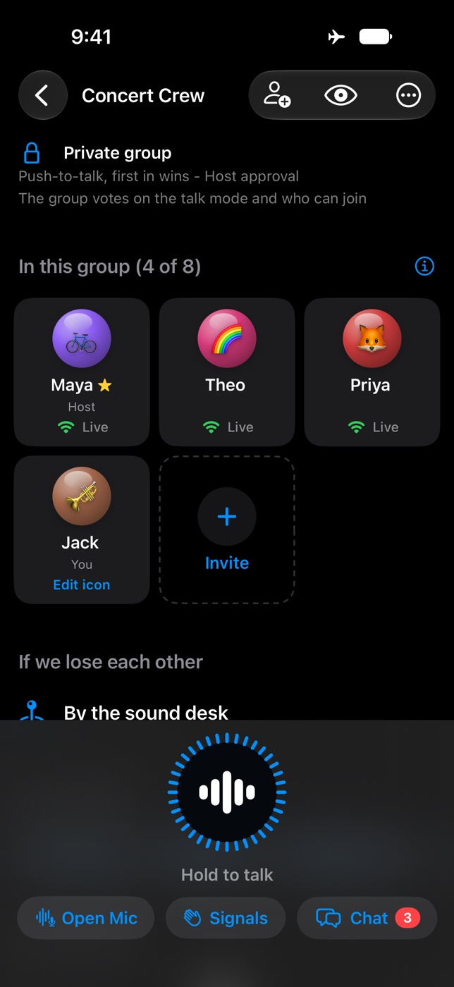 The group screen in the Grid layout: a tile for each person with their emoji icon, the meeting point “By the sound desk” below, and the talk button with Open Mic, Signals and Chat.